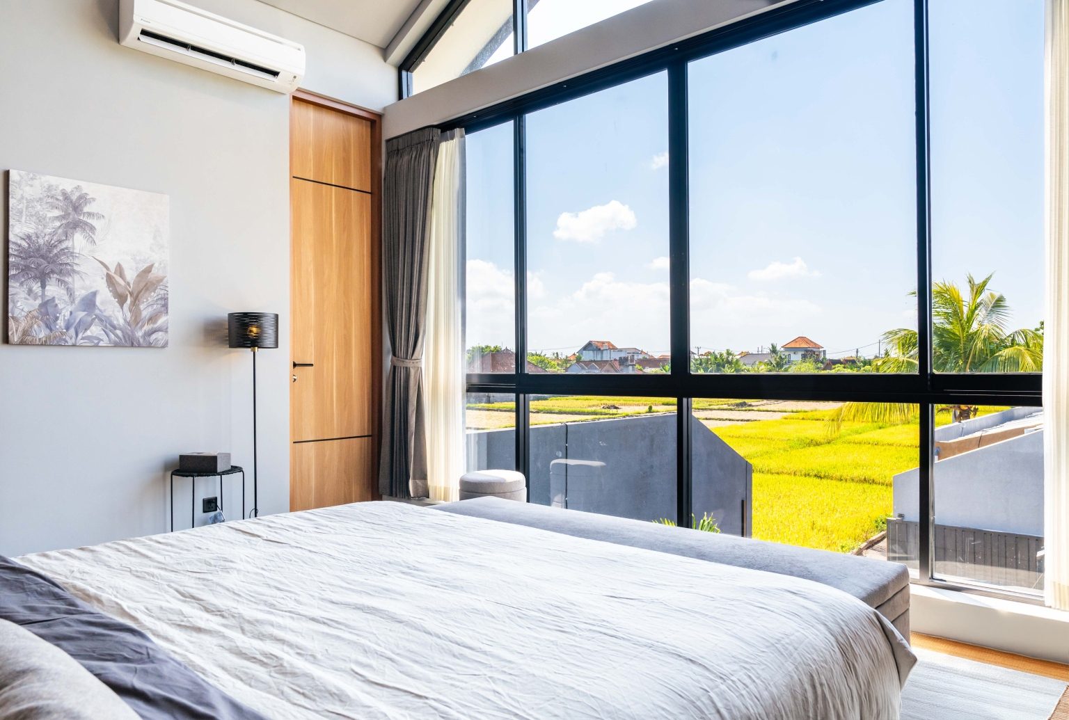AMANI villa in Munggu — bedroom overlooking the rice fields